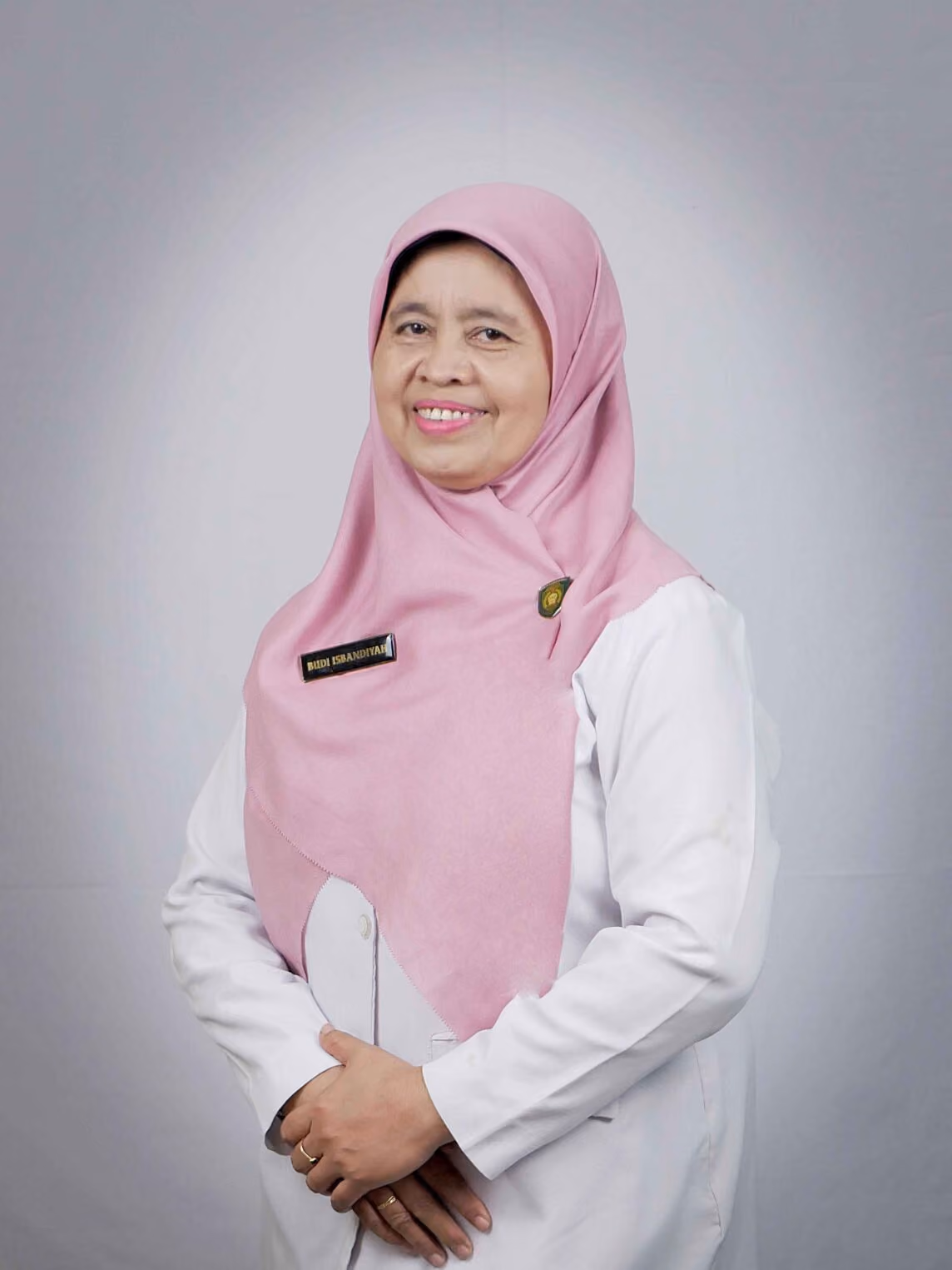 Dra. Budi Isbandiyah